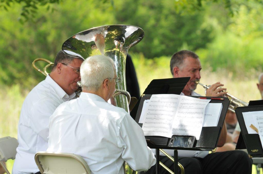 The TPO Brass Quintet: Marcus Arnold, Brent Gerlach and Alan Suska.